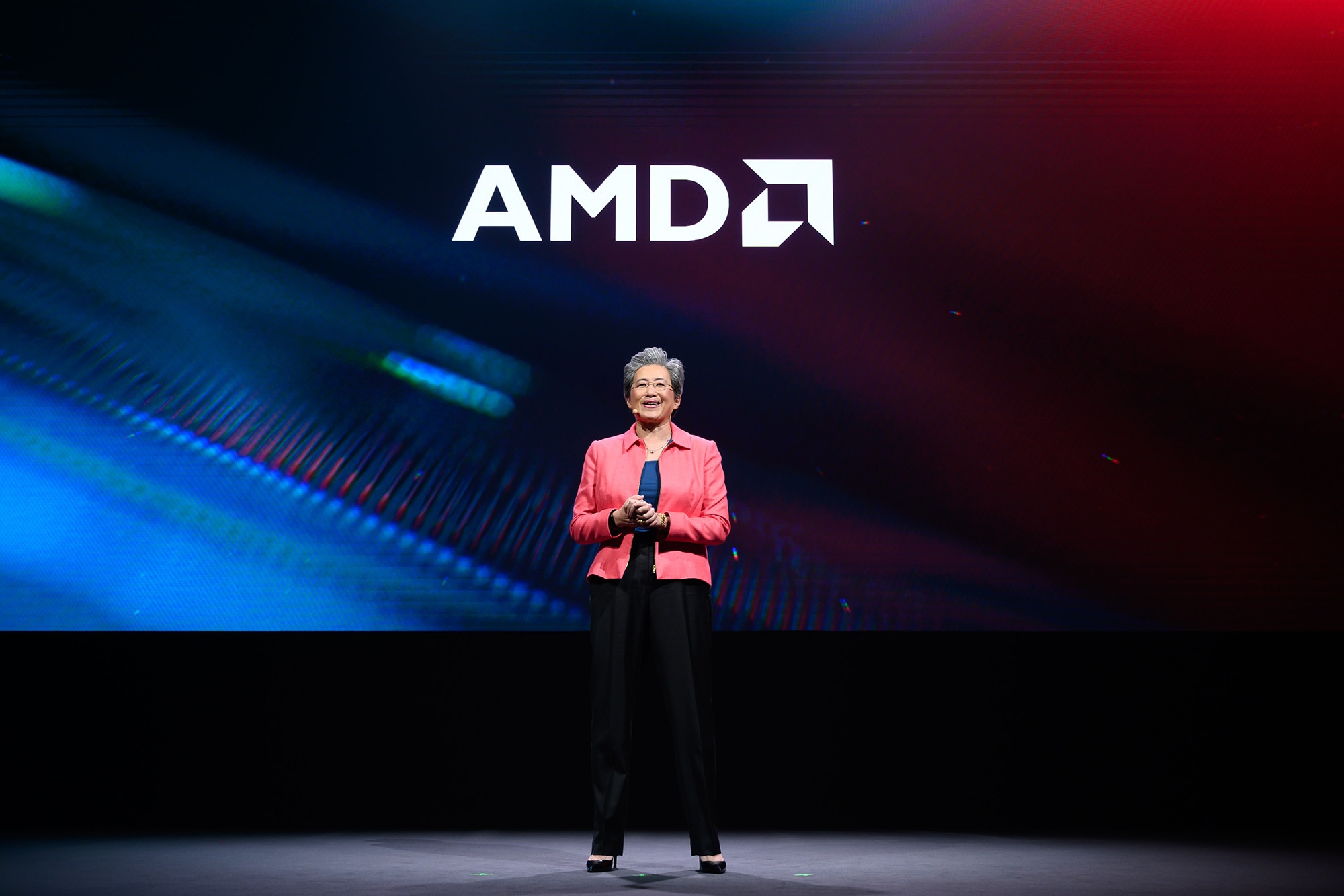 AMD shares climbed toward a $900B valuation as AI optimism returned and analysts highlighted long-term growth opportunities.