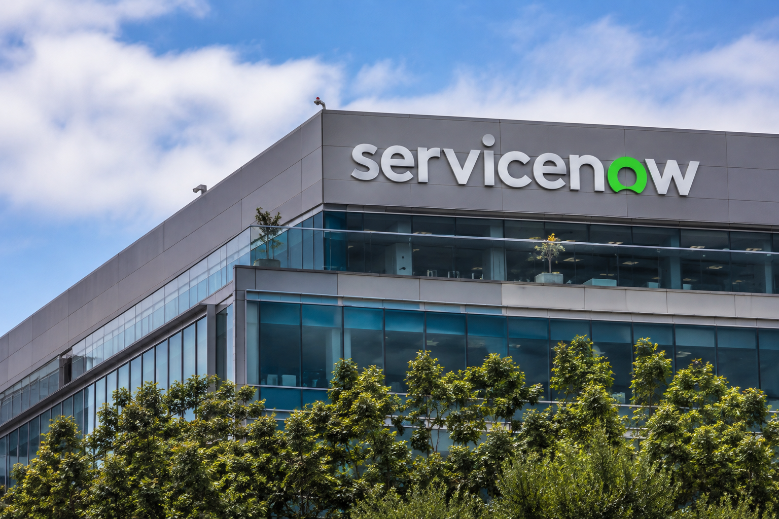 ServiceNow logo displayed on the exterior of a modern office building.