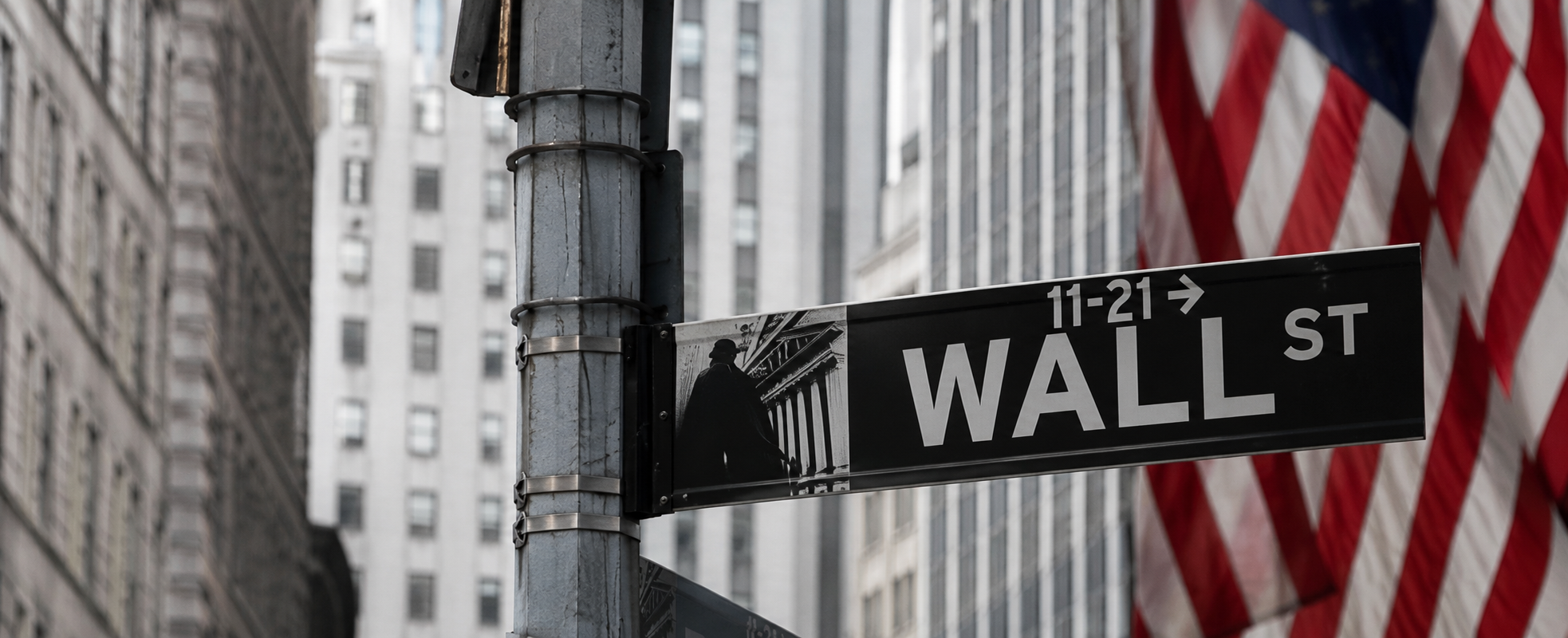 wall street sign on a post