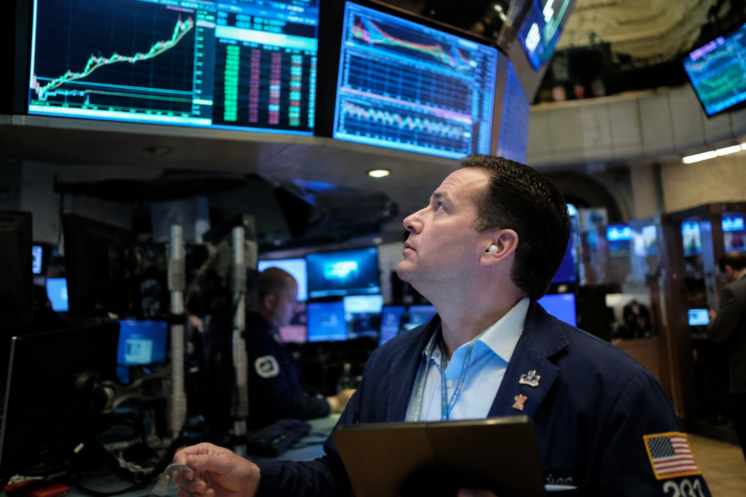 An Investor looking at stocks at trading exchange