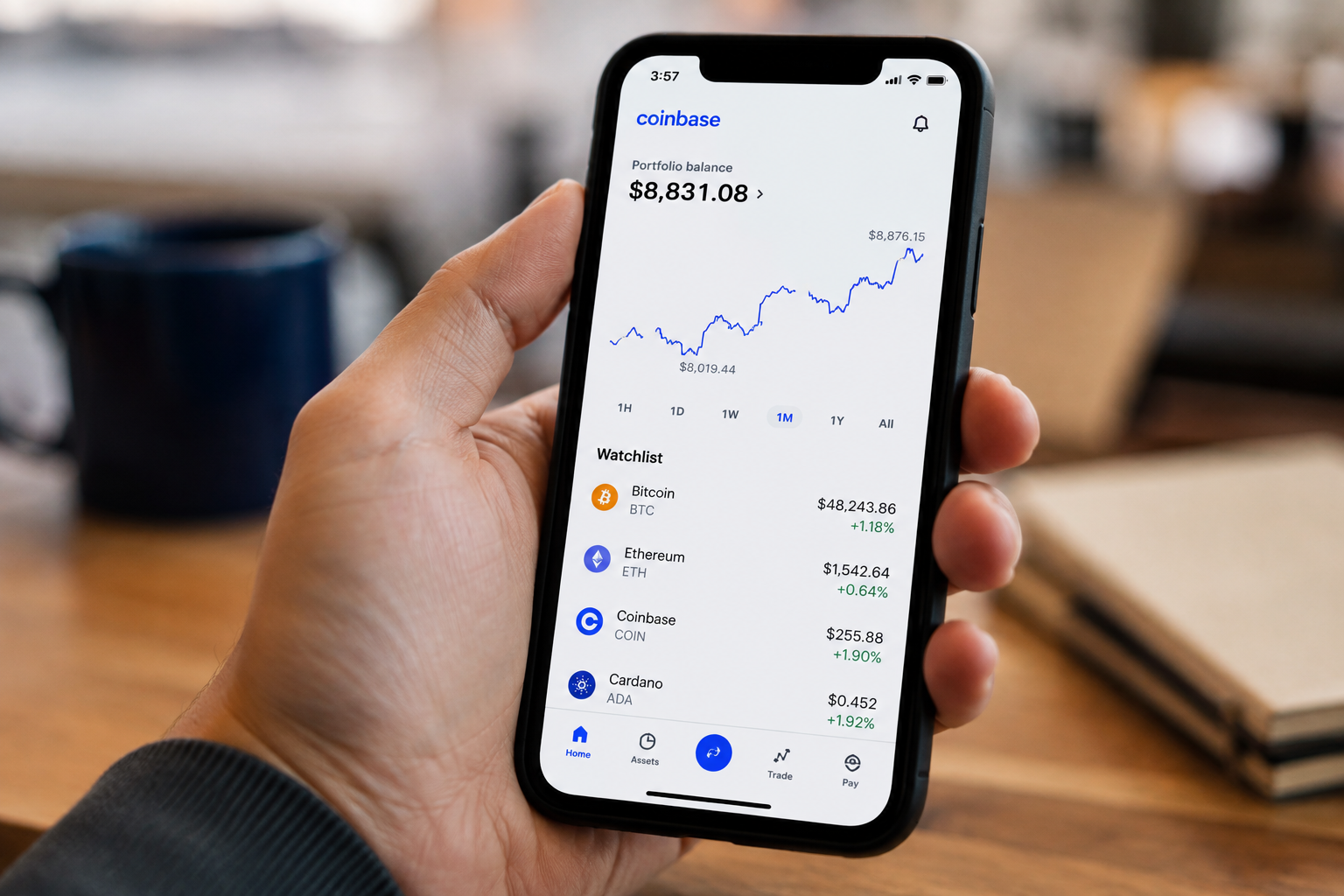 Coinbase crypto app showing Bitcoin and Ethereum prices on a smartphone