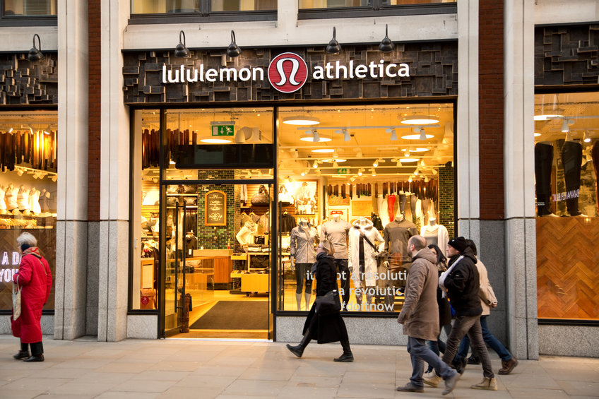 Lululemon Athletica store entrance with shoppers walking past