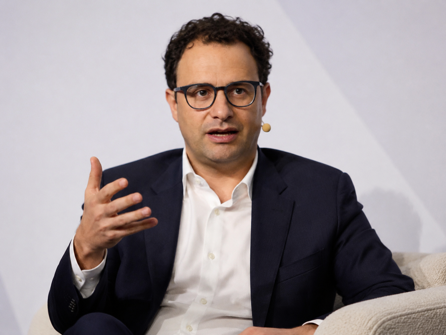 Dario Amodei speaking at a conference