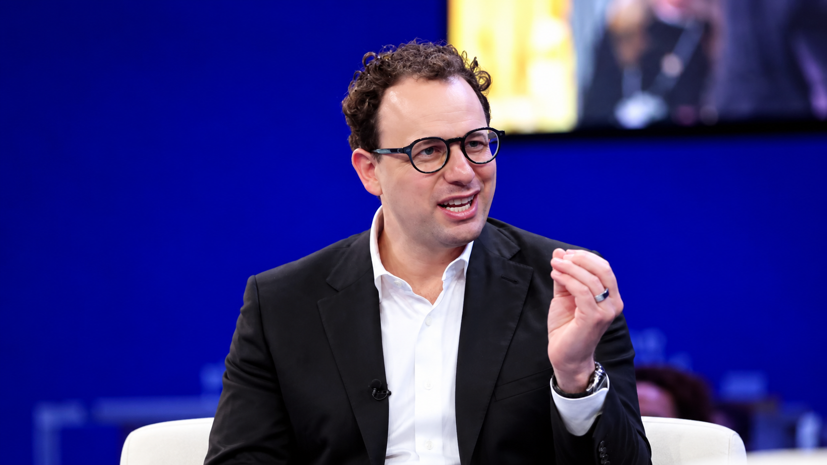 Anthropic CEO Dario speaking at an event