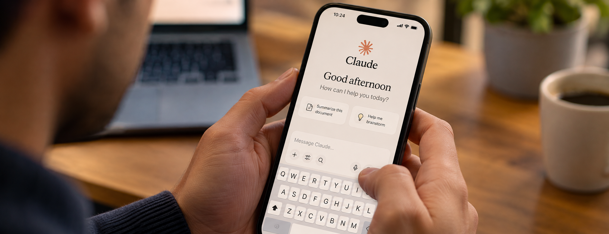 A person using Anthropic's Claude on phone
